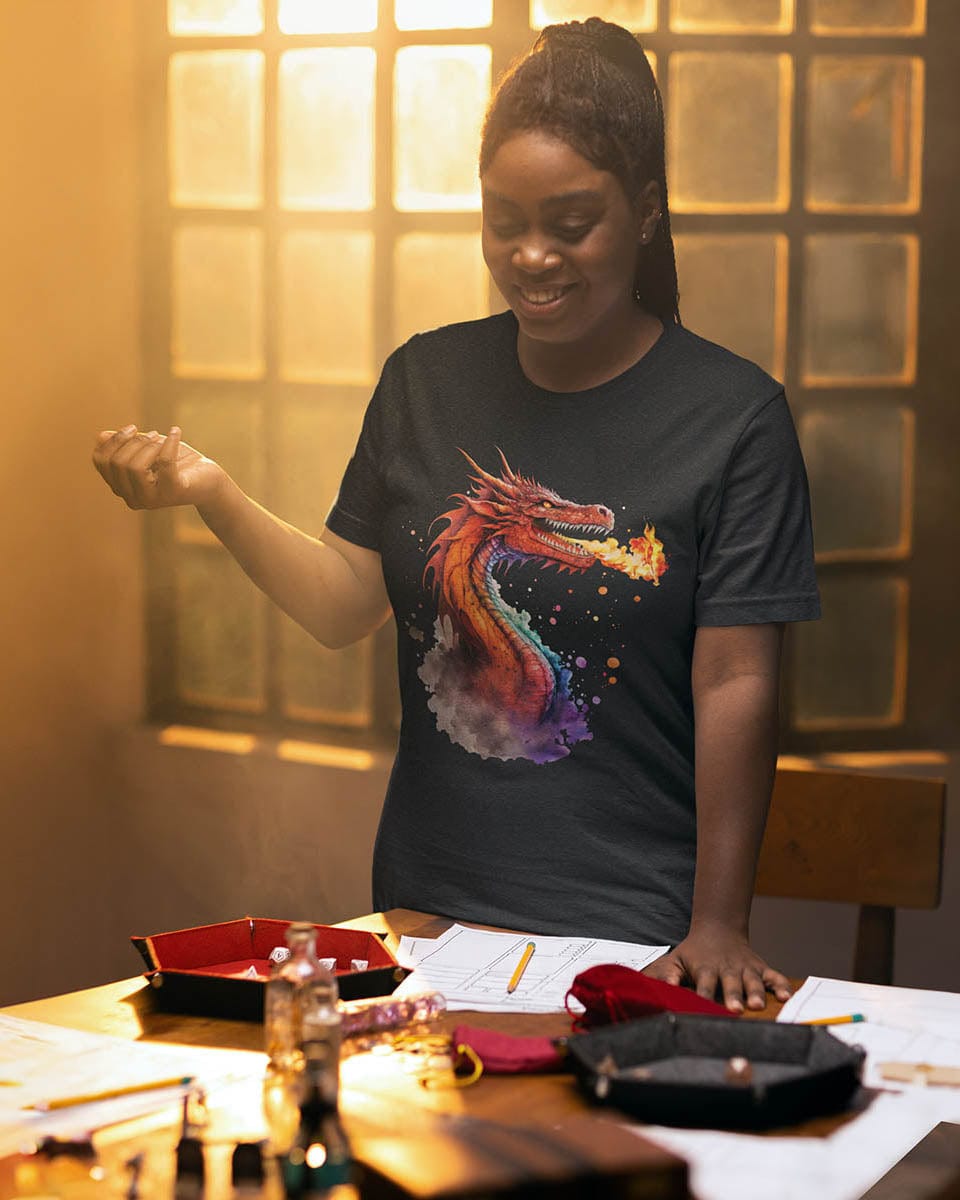 Woman wearing a Blazing Fury shirt, featuring watercolor art of a fire-breathing dragon. She is playing a tabletop RPG.