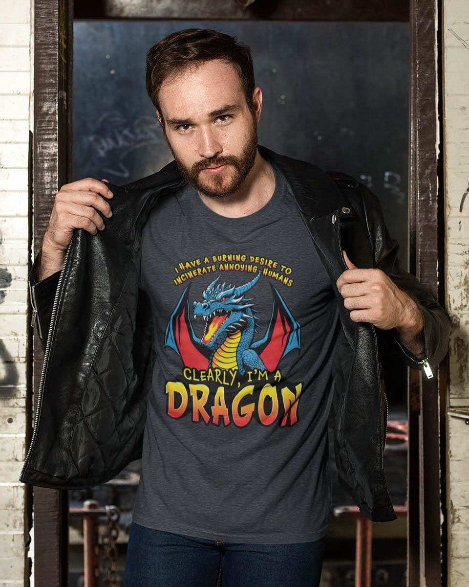Man wearing a Dragon shirt that says, "I HAVE A BURNING DESIRE TO INCINERATE ANNOYING HUMANS / CLEARLY, I’M A DRAGON".