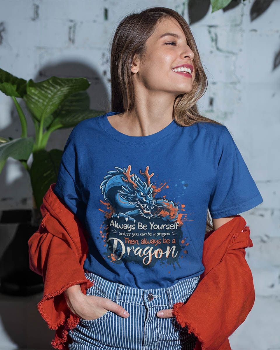 Woman wearing an Eastern dragon shirt worded "Always Be Yourself unless you can be a dragon Then, always be a Dragon."