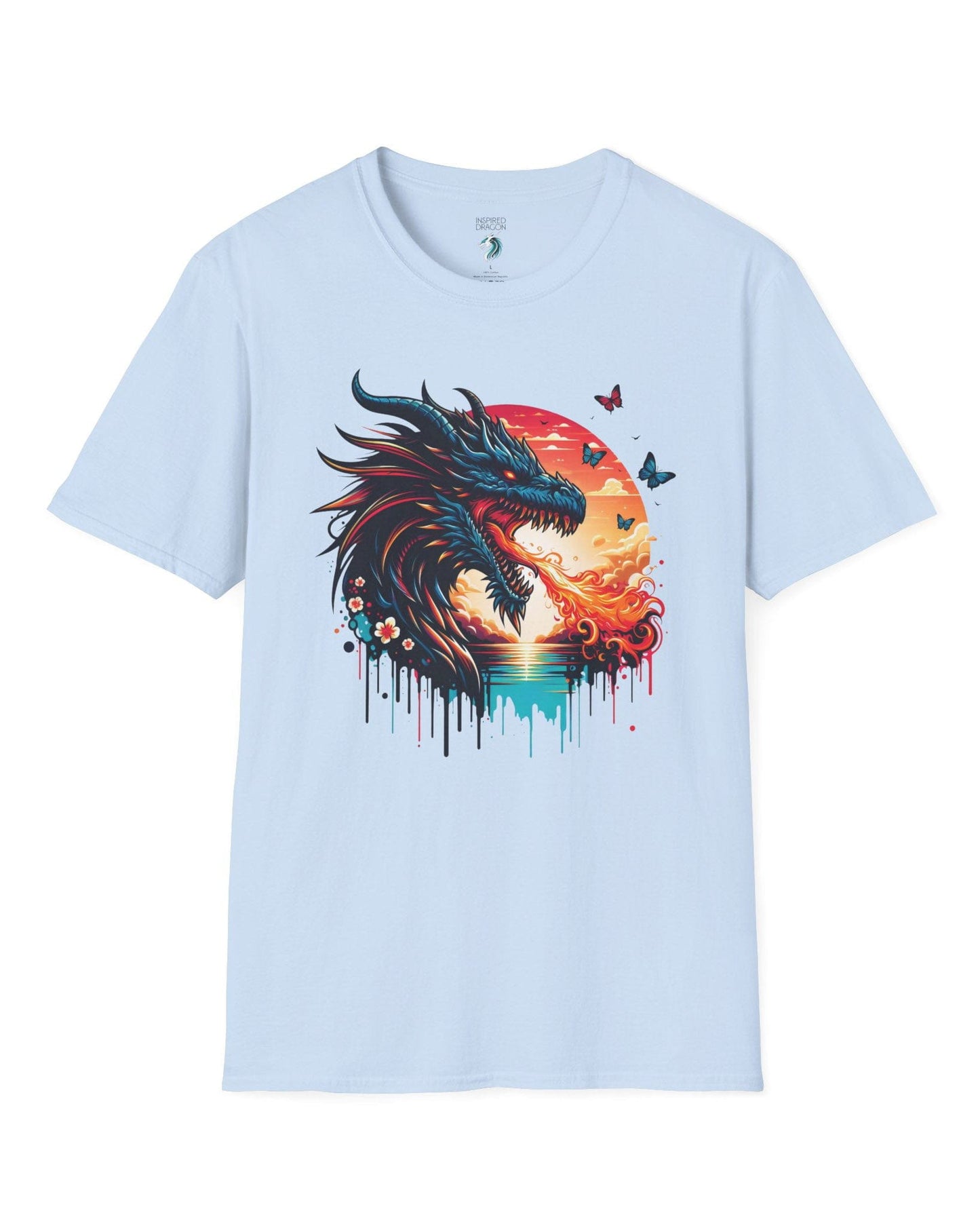Sunset Inferno shirt in light blue featuring a fire-breathing dragon against a vibrant sunset with floral accents.