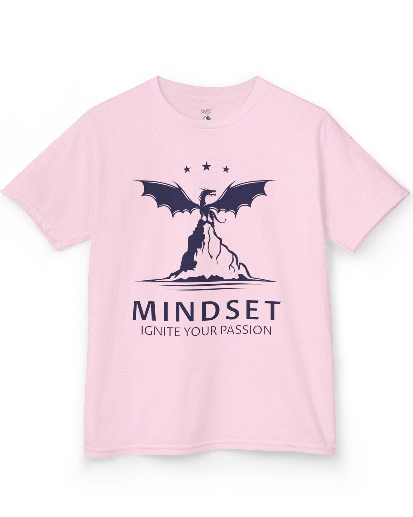 Ignite Your Passion shirt in light pink featuring a dragon atop a mountain with stars and motivational text below.