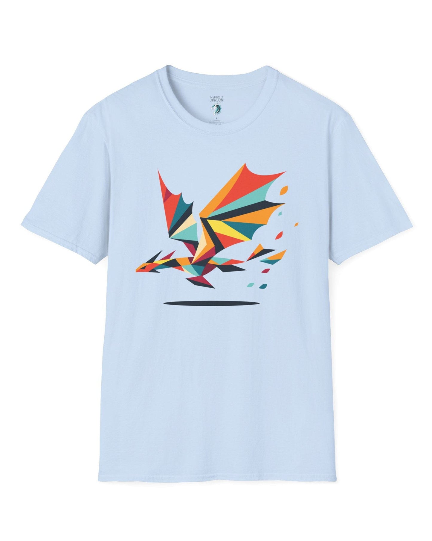 Geometry of Flight shirt in light blue featuring a colorful low-poly dragon flying with fragmented shapes trailing behind.