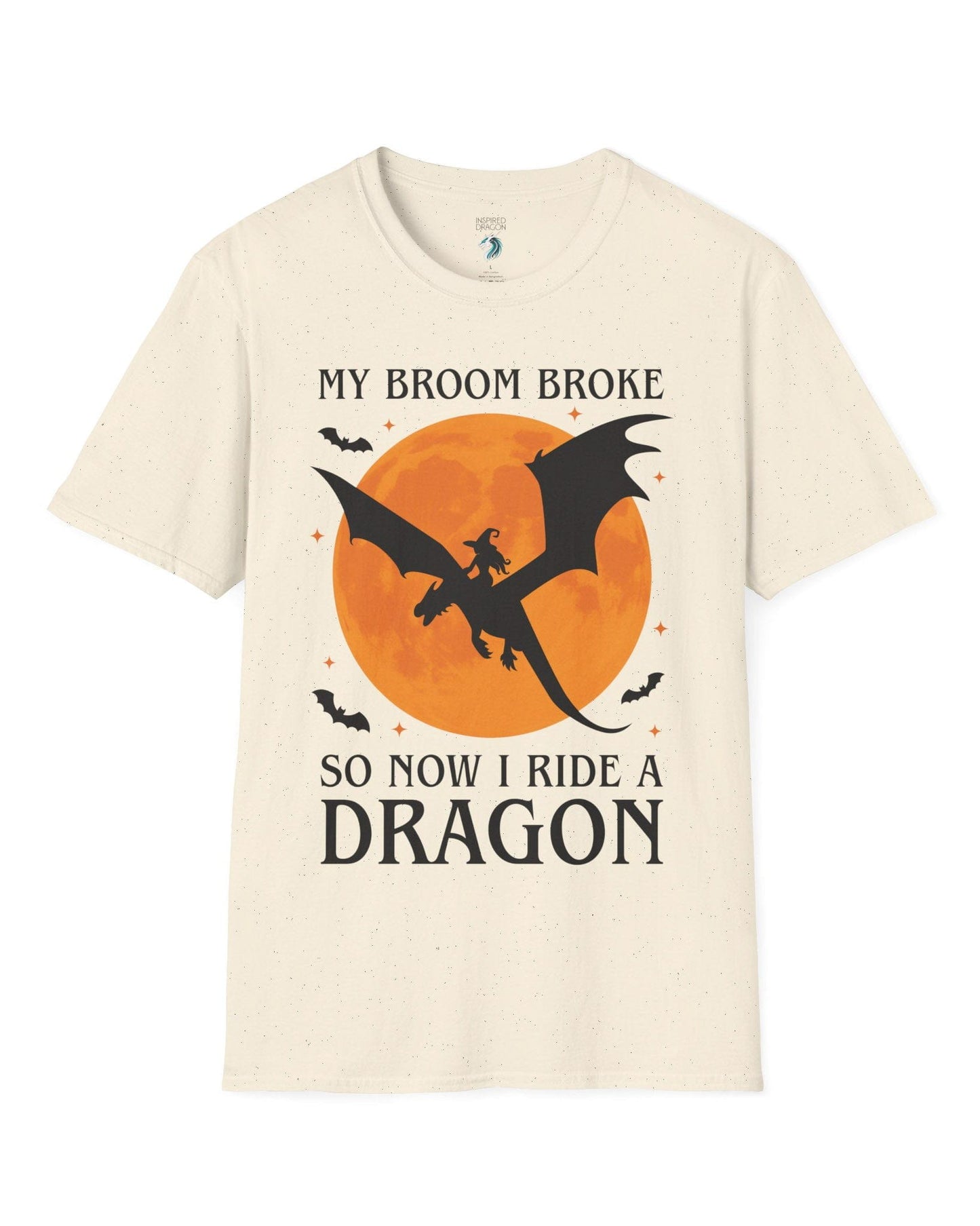 My Broom Broke shirt in natural featuring a witch riding a dragon across an orange full moon with bats.
