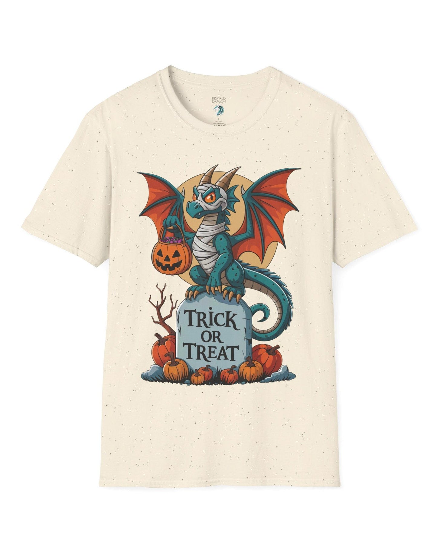 Trick or Treat shirt in natural featuring a mummy dragon on a tombstone with pumpkins and a full moon.
