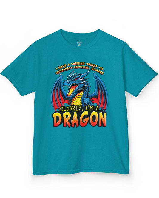 Clearly I'm a Dragon shirt in tropical blue featuring a fiery blue dragon with bold comic-style lettering.