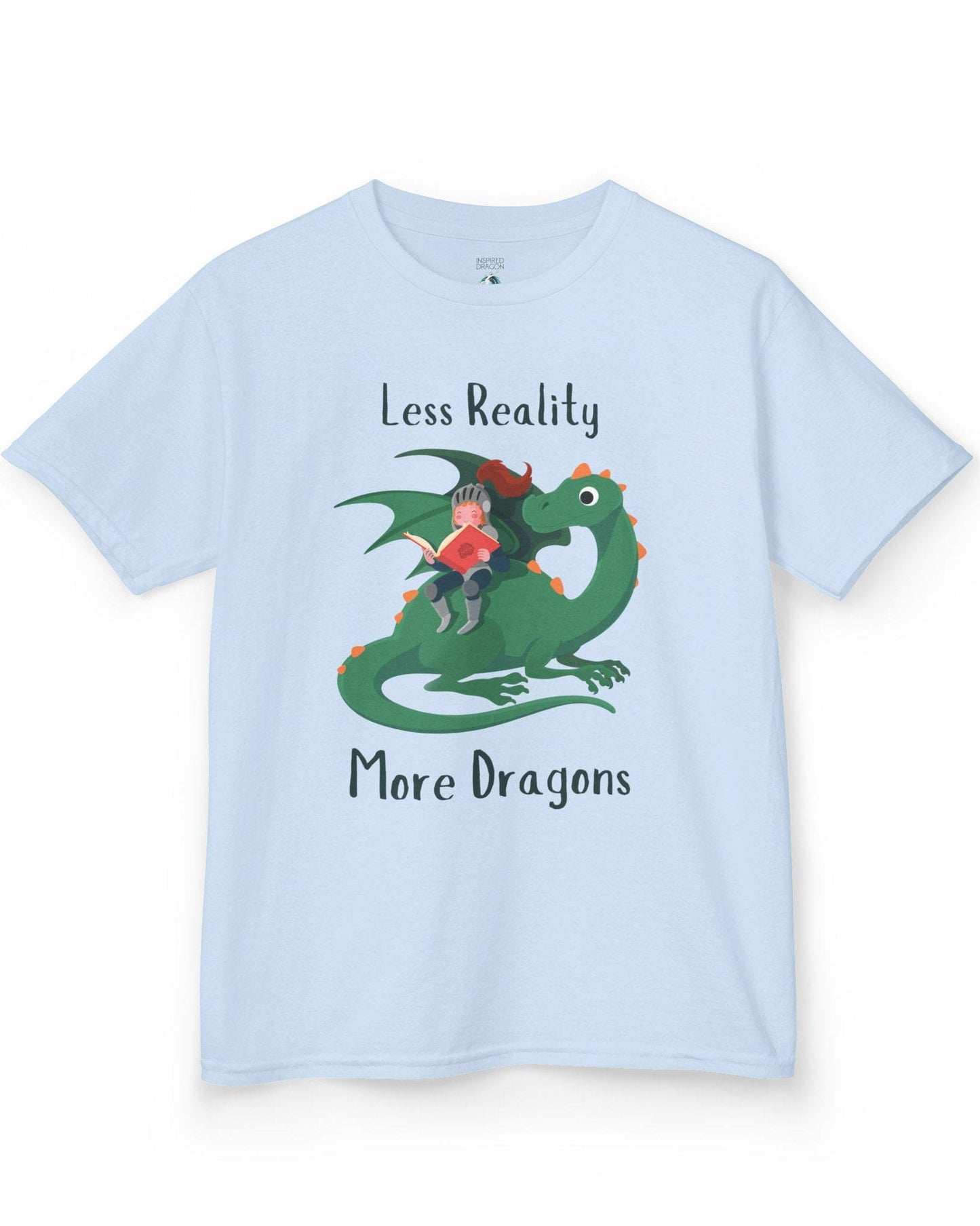 Less Reality, More Dragons shirt in light blue featuring a knight reading a book while riding a friendly green dragon.