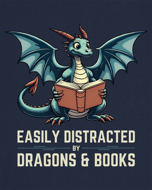 Easily Distracted by Dragons & Books shirt in navy featuring a teal dragon reading an open book with wide eyes.