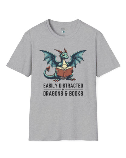 Easily Distracted by Dragons & Books shirt in sport grey featuring a teal dragon reading an open book with wide eyes.
