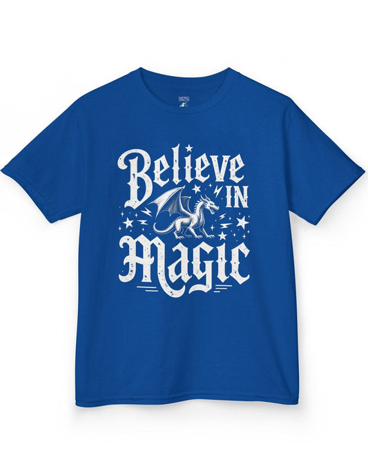 Believe in Magic shirt in royal blue, featuring bold text and a dragon surrounded by stars and lightning bolts.