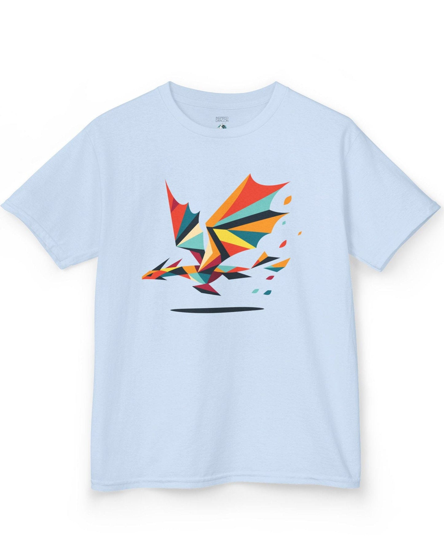 Geometry of Flight shirt in light blue featuring a colorful low-poly dragon flying with fragmented shapes trailing behind.