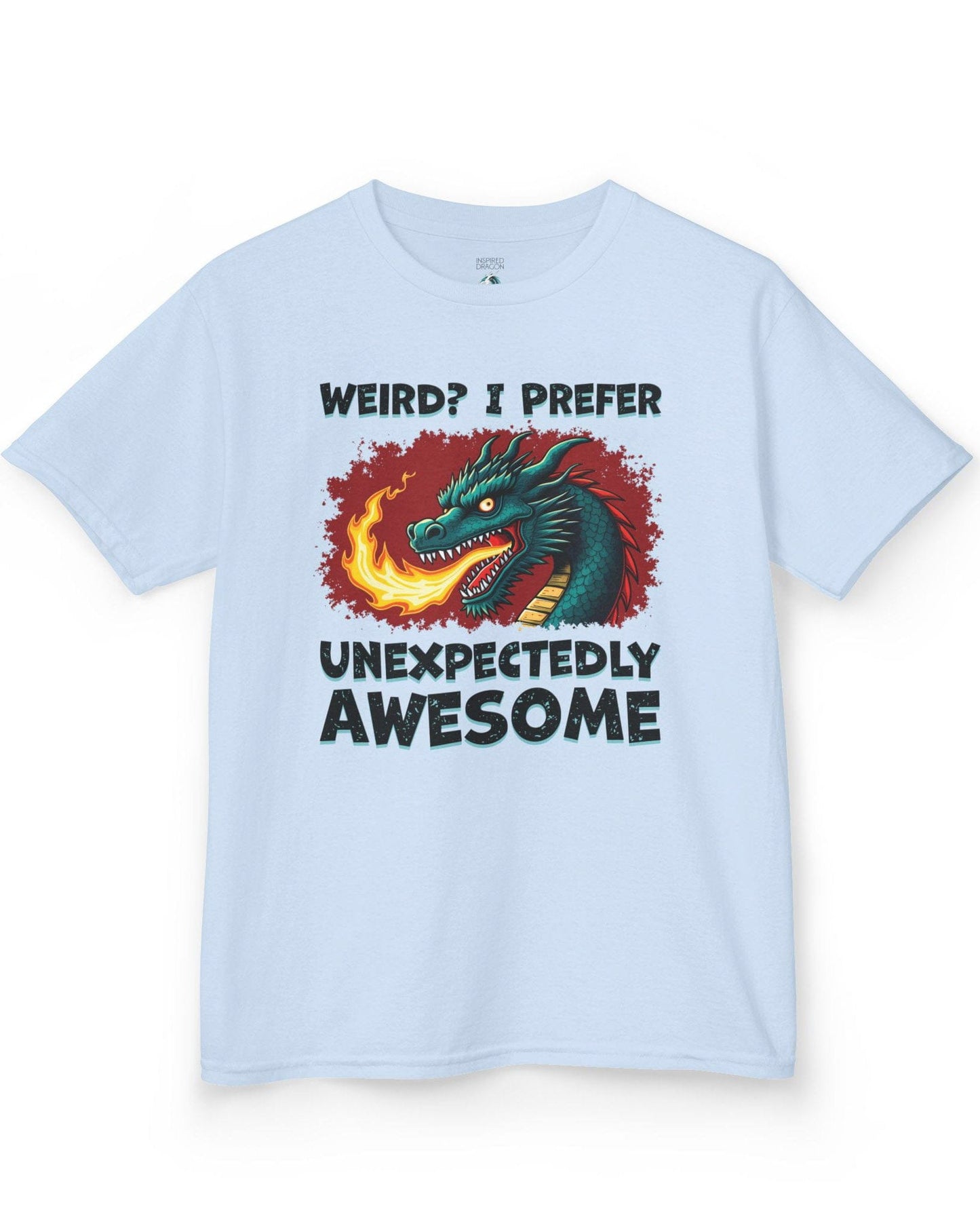 Unexpectedly Awesome Dragon shirt in light blue featuring a fire-breathing dragon with bold red and yellow text.