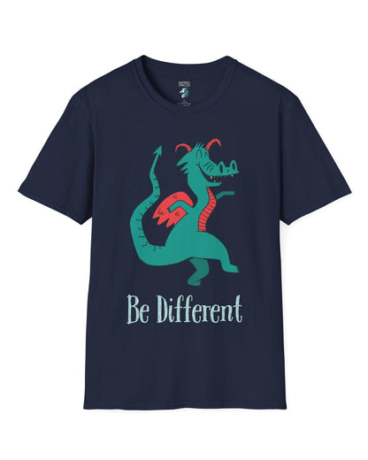 Be Different shirt in navy featuring a quirky teal dragon with red wings dancing joyfully with text underneath.
