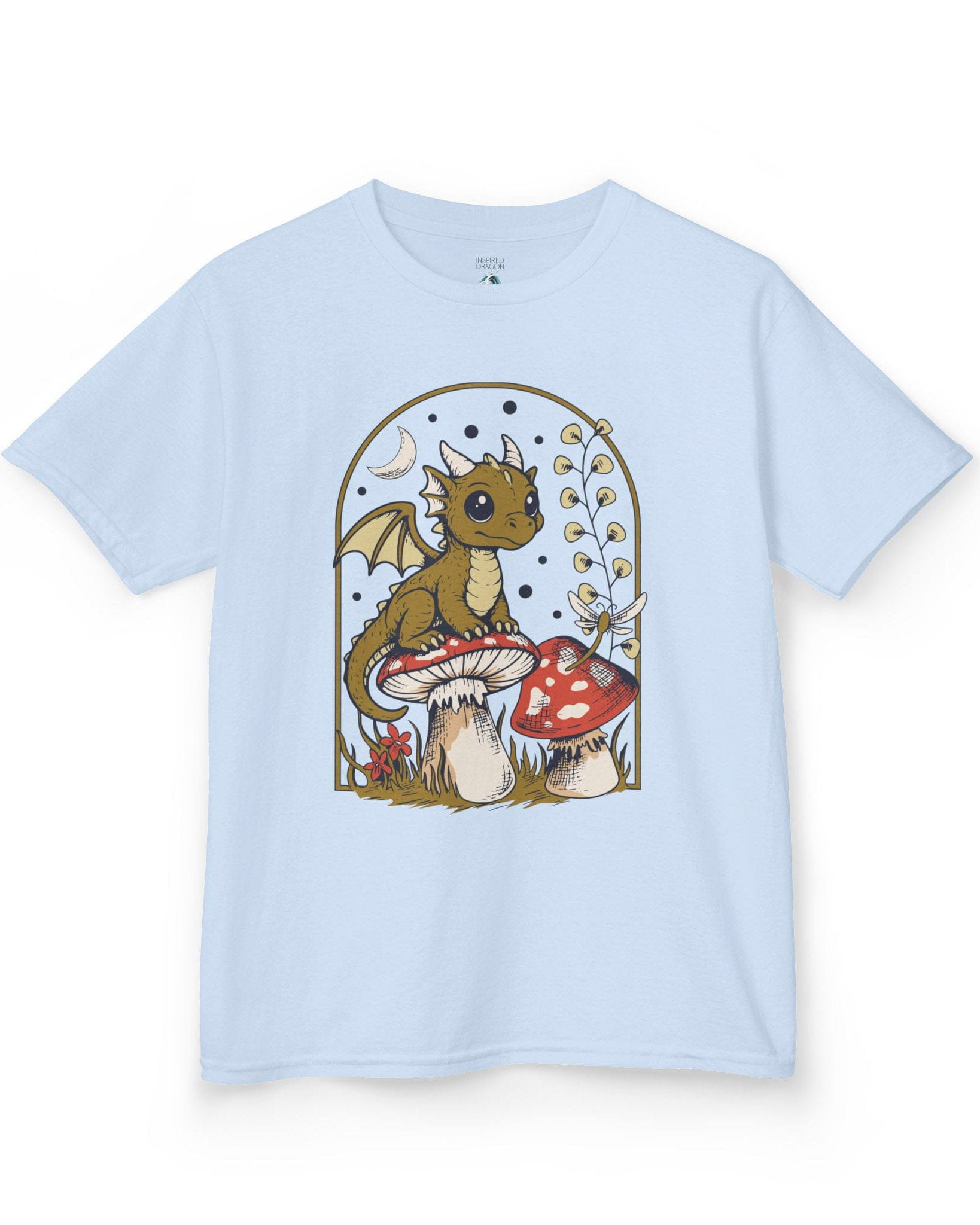 Moonlit Magic shirt in light blue featuring a wide-eyed dragon sitting on a mushroom beneath a crescent moon.