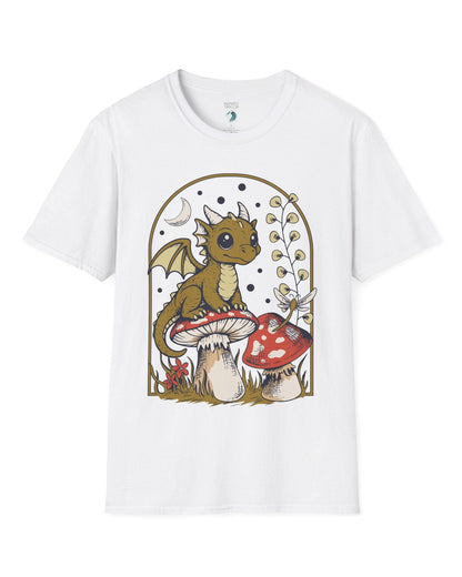 Moonlit Magic shirt in white featuring a wide-eyed dragon sitting on a mushroom beneath a crescent moon.
