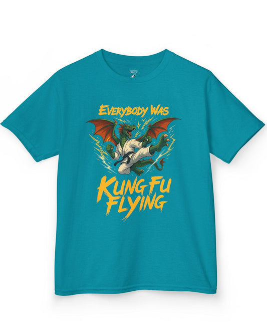 Everybody Was Kung Fu Flying shirt in tropical blue featuring a dragon in a martial arts gi in a dynamic flying kick pose.