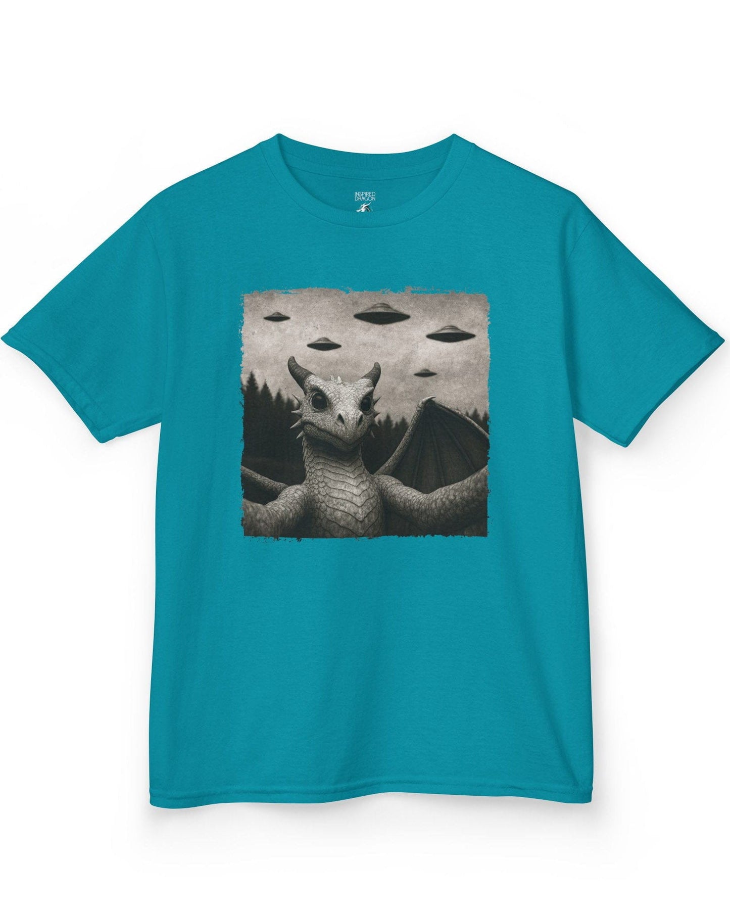 Dragon UFO Selfie shirt in tropical blue, featuring a grayscale dragon taking a selfie with flying saucers overhead.