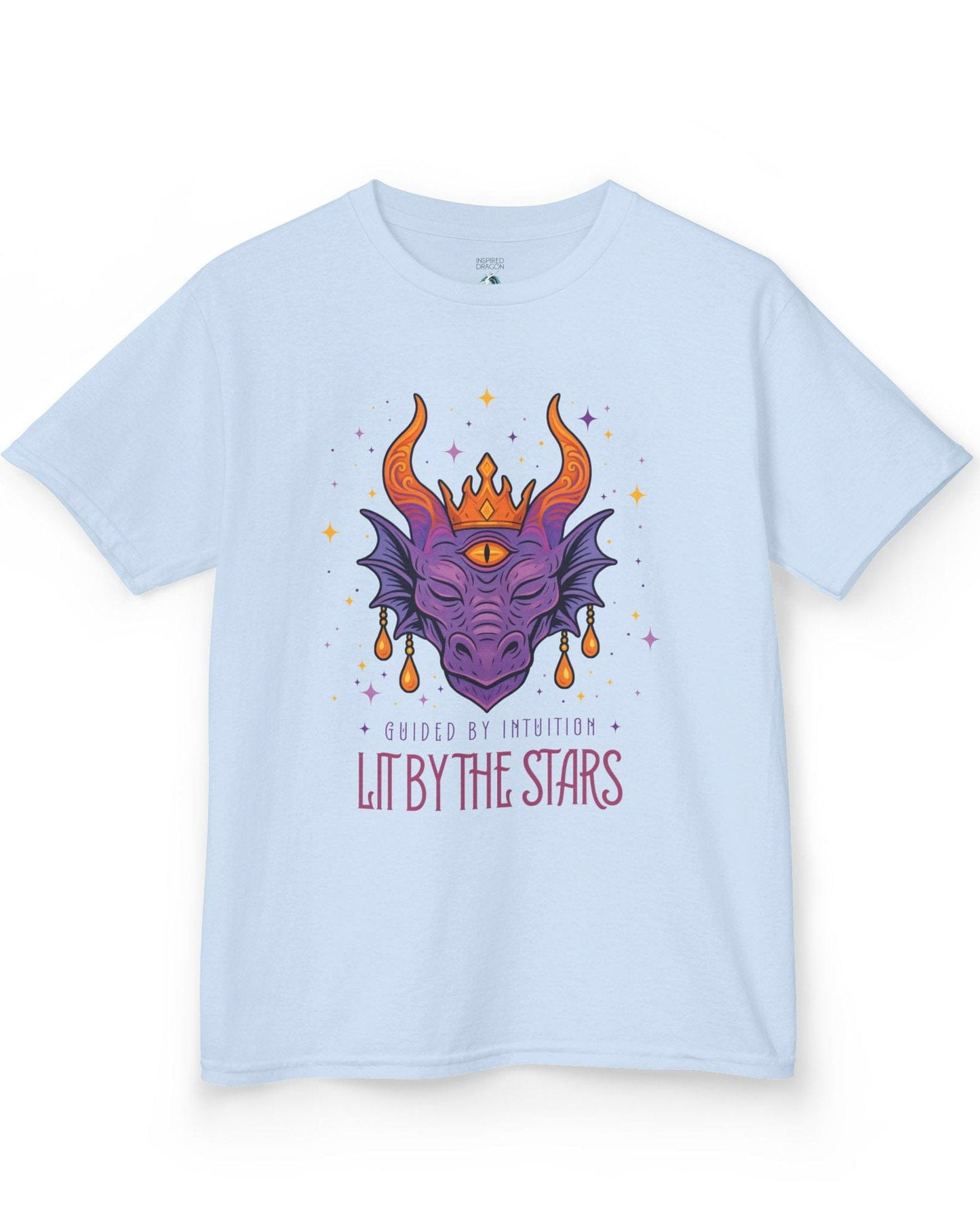 Lit by the Stars shirt in light blue featuring a crowned purple dragon with a third eye, surrounded by colorful stars.
