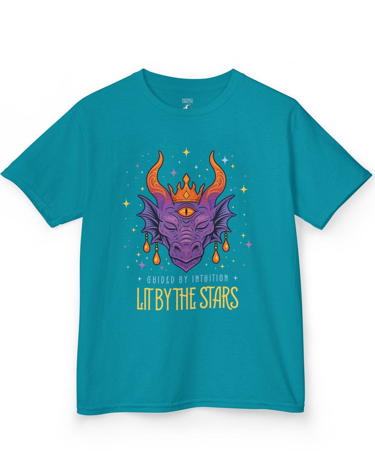 Lit by the Stars shirt in tropical blue featuring a crowned purple dragon with a third eye, surrounded by colorful stars.