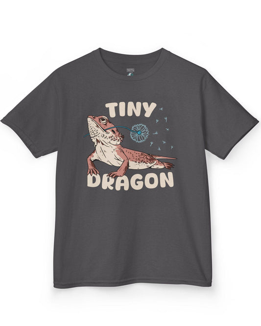 Tiny Dragon shirt in charcoal, featuring puffy text and a bearded dragon holding a dandelion in its mouth.