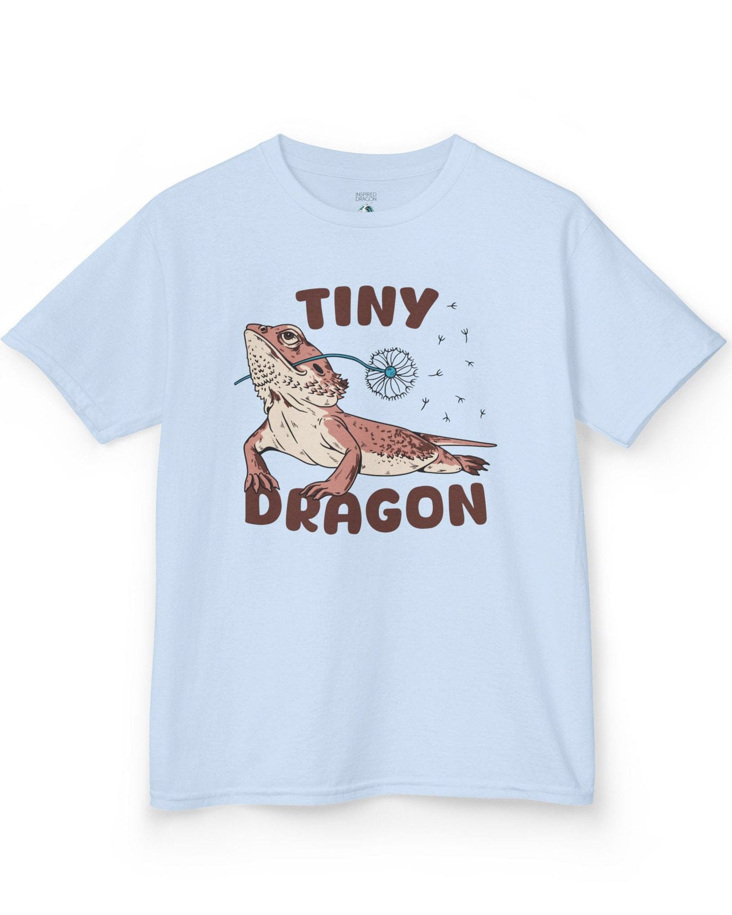 Tiny Dragon shirt in light blue, featuring puffy text and a bearded dragon holding a dandelion in its mouth.