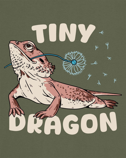Tiny Dragon shirt in military green, featuring puffy text and a bearded dragon holding a dandelion in its mouth.