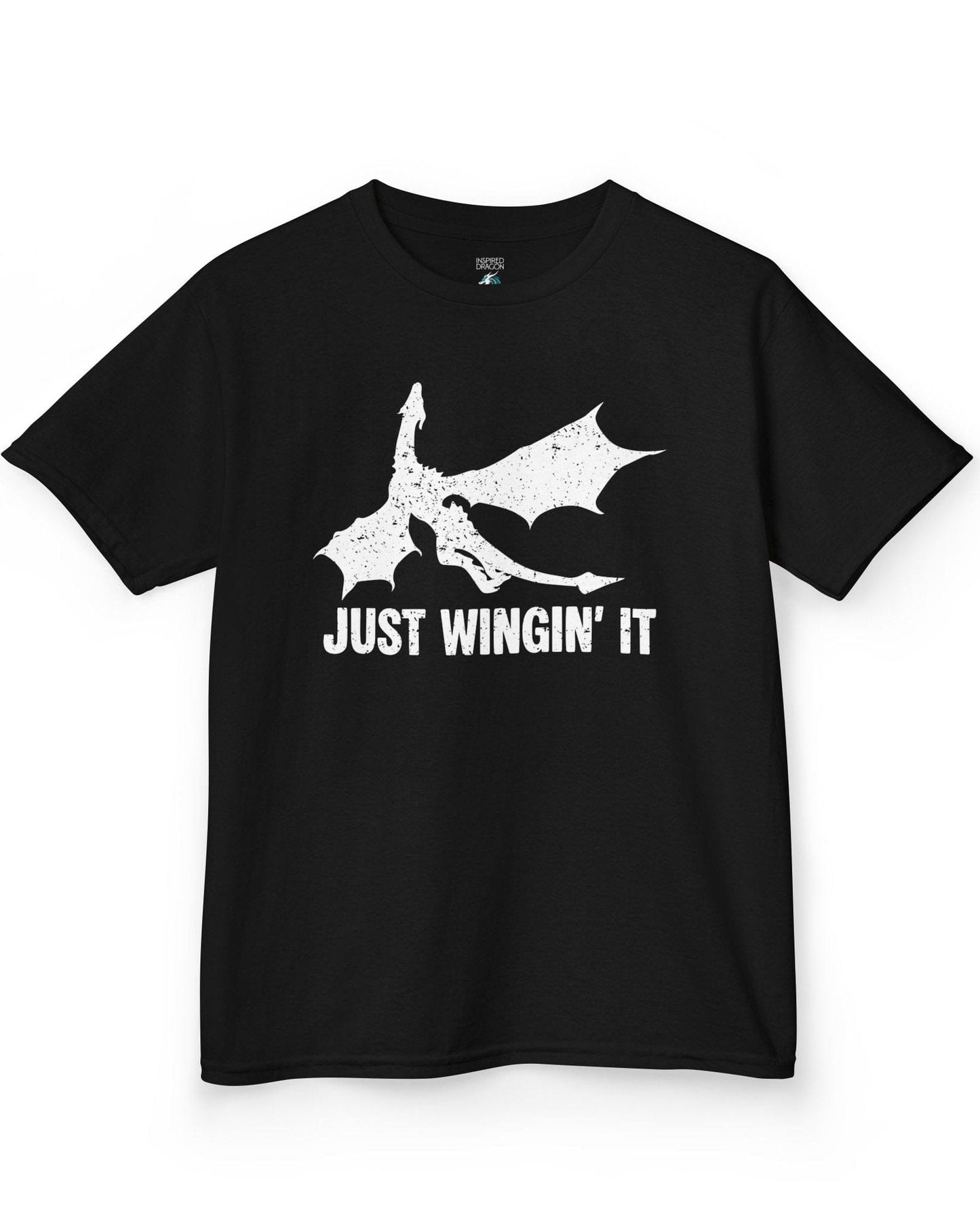 Just Wingin' It shirt in black, featuring a distressed silhouette of a flying dragon above bold text.