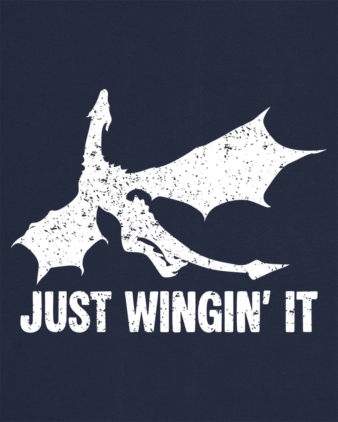 Just Wingin' It shirt in navy, featuring a distressed silhouette of a flying dragon above bold text.