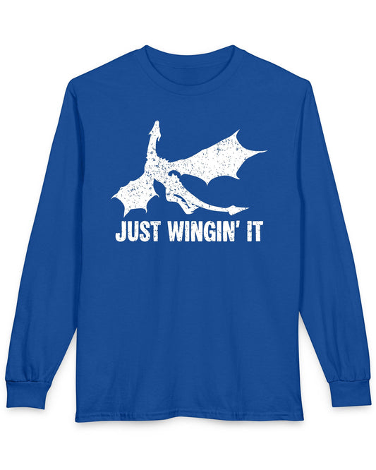 Just Wingin' It shirt in royal blue featuring a distressed silhouette of a flying dragon above bold text