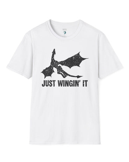 Just Wingin' It shirt in white, featuring a distressed silhouette of a flying dragon above bold text.