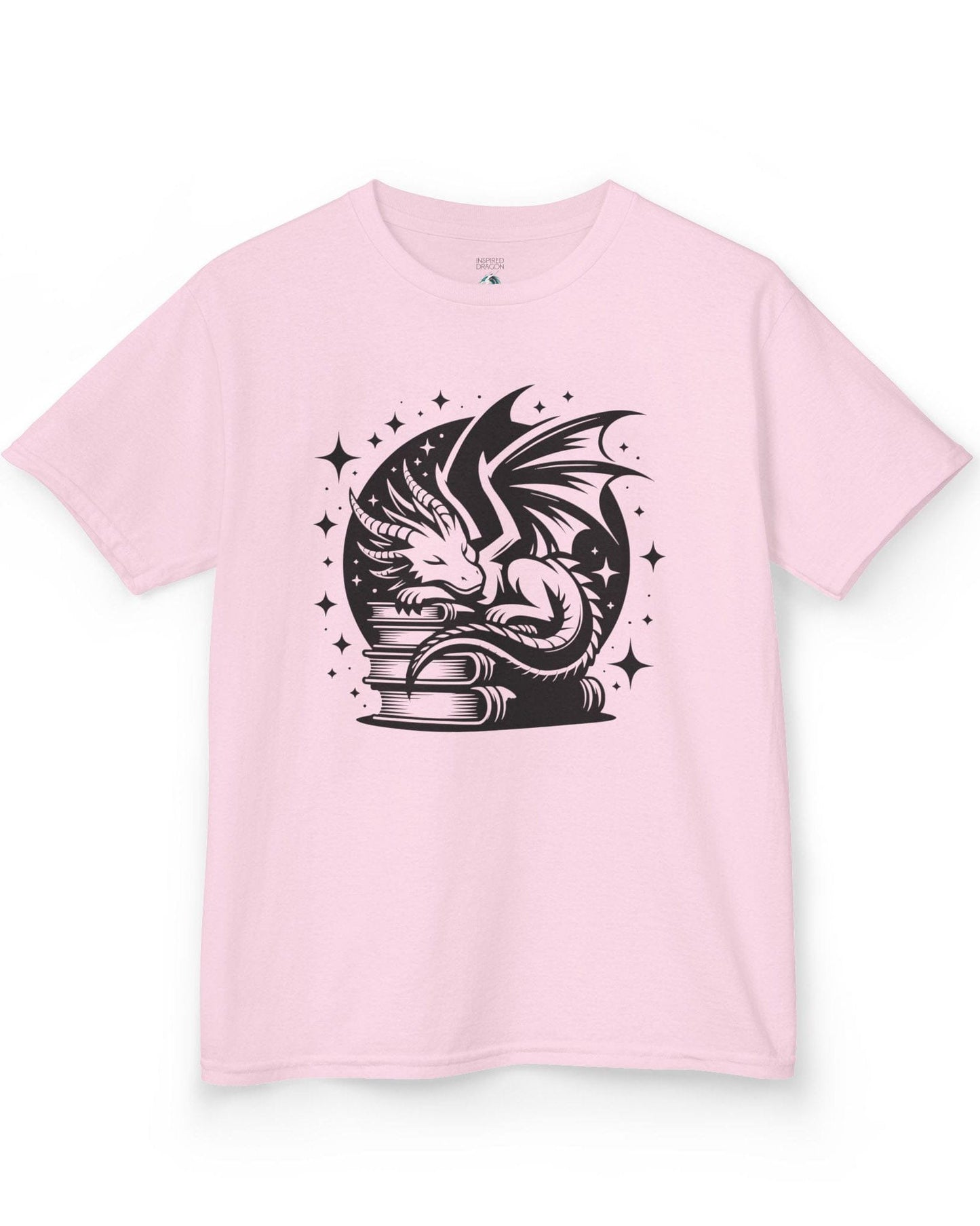 Guardian of Tales shirt in light pink, featuring a dragon sleeping atop a stack of books under a starry moon.