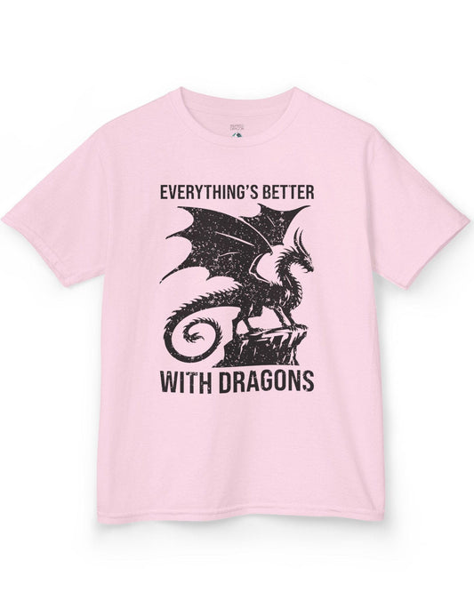 Everything's Better with Dragons shirt in light pink, featuring a distressed dragon silhouette perched on a rock.