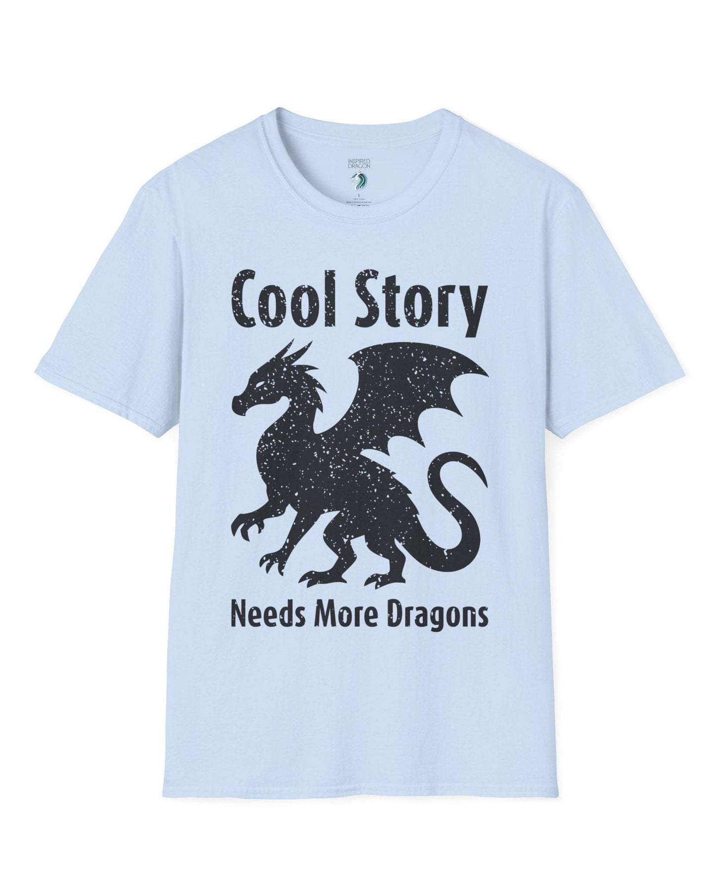 Cool Story, Needs More Dragons shirt in light blue featuring a distressed dragon silhouette with text above and below.