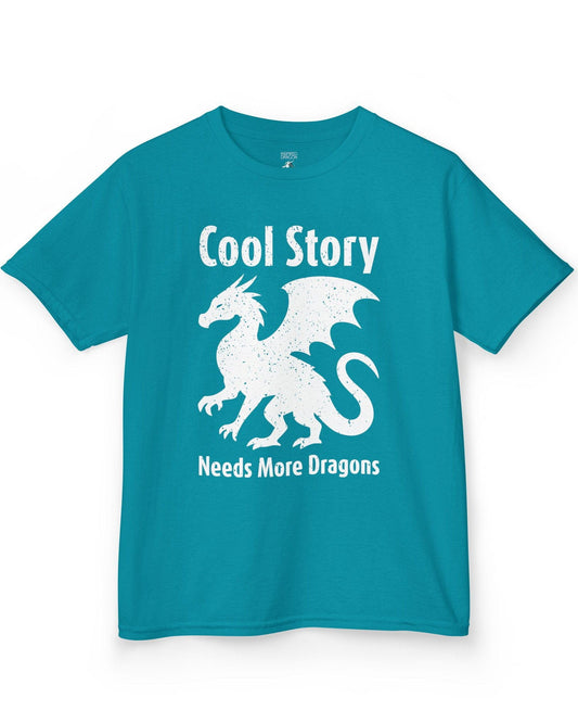 Cool Story, Needs More Dragons shirt in tropical blue featuring a distressed dragon silhouette with text above and below.