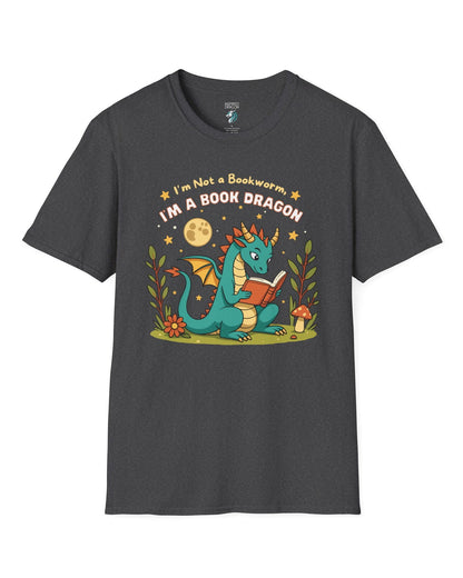 I'm a Book Dragon shirt in dark heather grey featuring a teal dragon reading under the moonlight with plants and mushrooms.