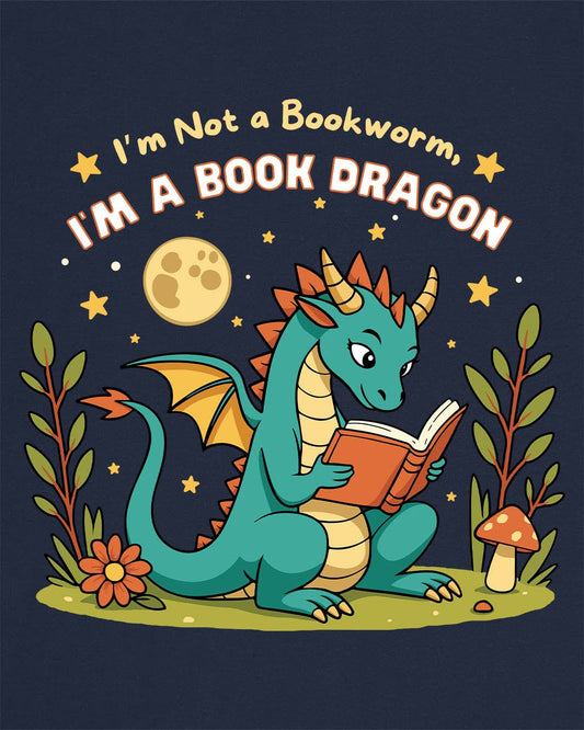 I'm a Book Dragon shirt in navy featuring a teal dragon reading under the moonlight with plants and mushrooms.