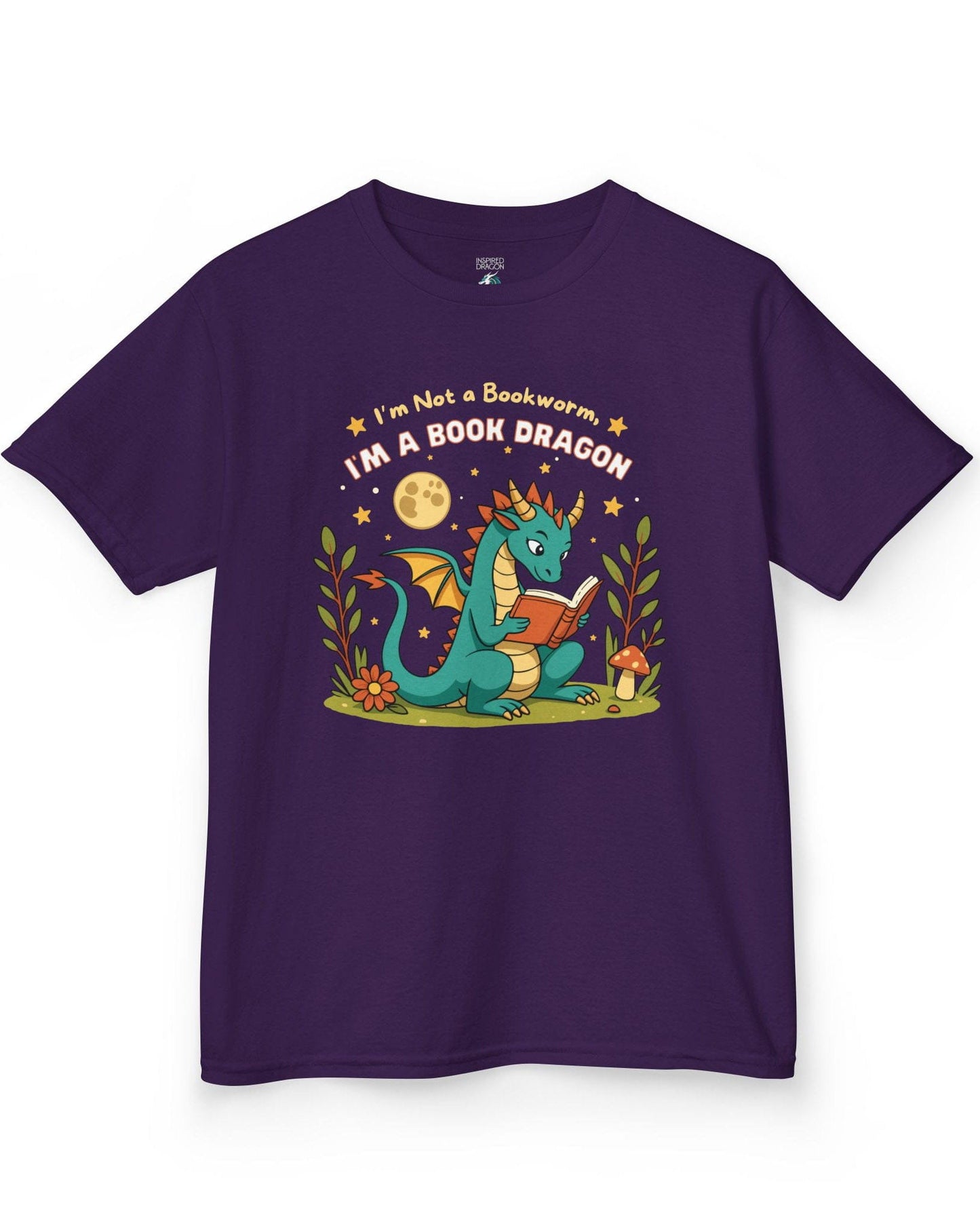 I'm a Book Dragon shirt in purple featuring a teal dragon reading under the moonlight with plants and mushrooms.