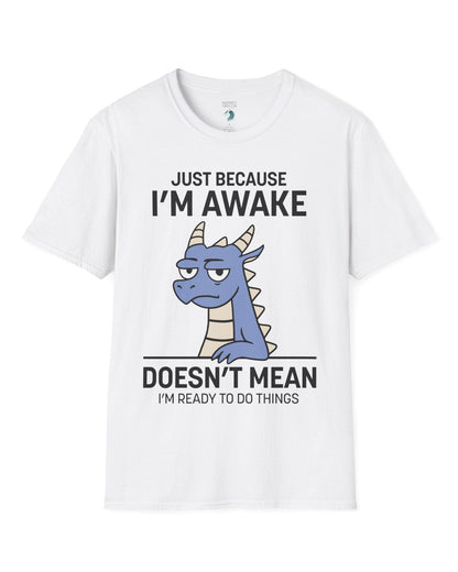 Just Because I'm Awake shirt in white featuring text and a sleepy dragon with a deadpan expression.