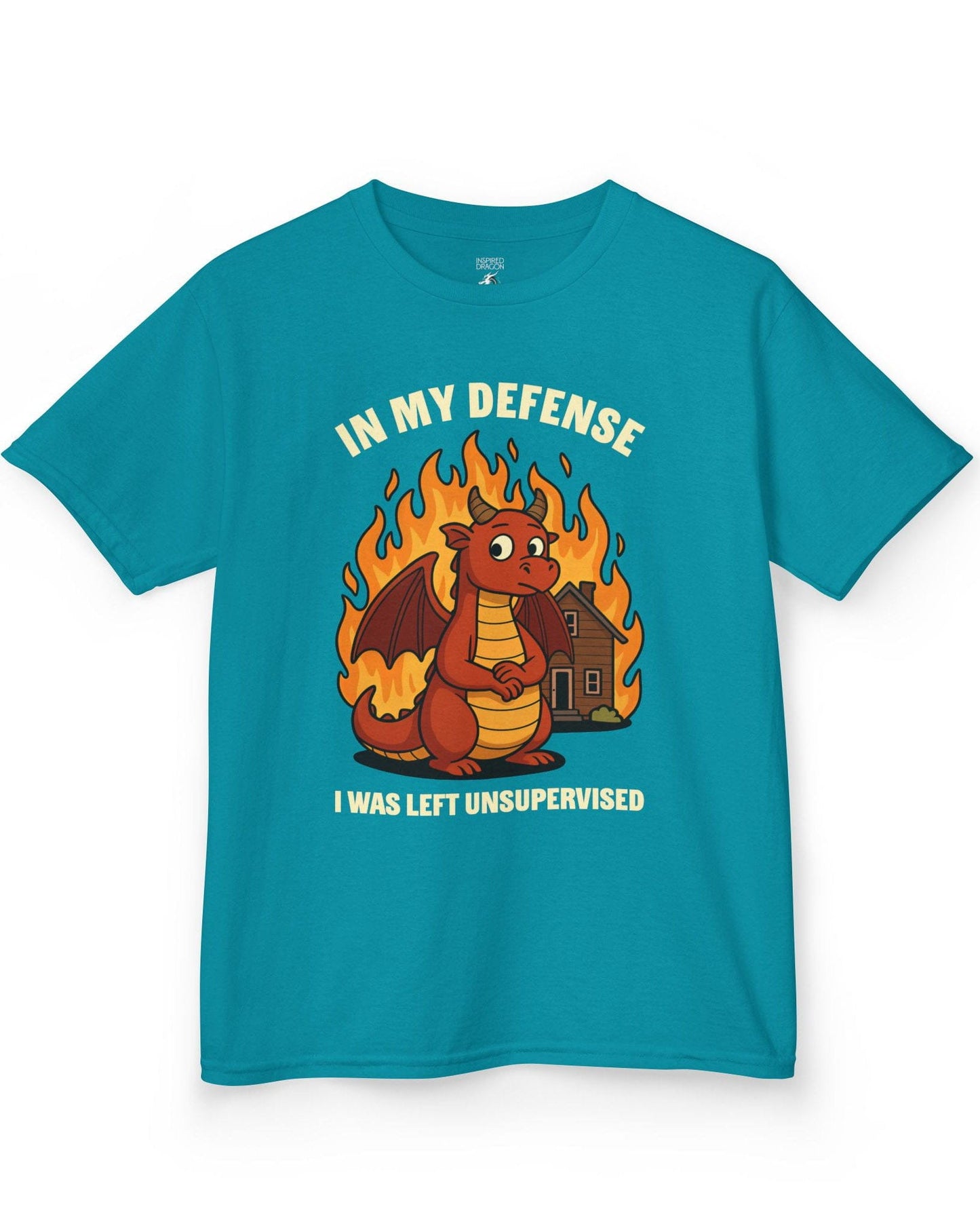 I Was Left Unsupervised shirt in tropical blue featuring a guilty-looking red dragon in front of a burning house.