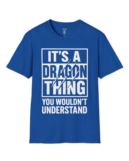 It's a Dragon Thing shirt in royal blue featuring bold distressed text with claw marks slashing through the design.