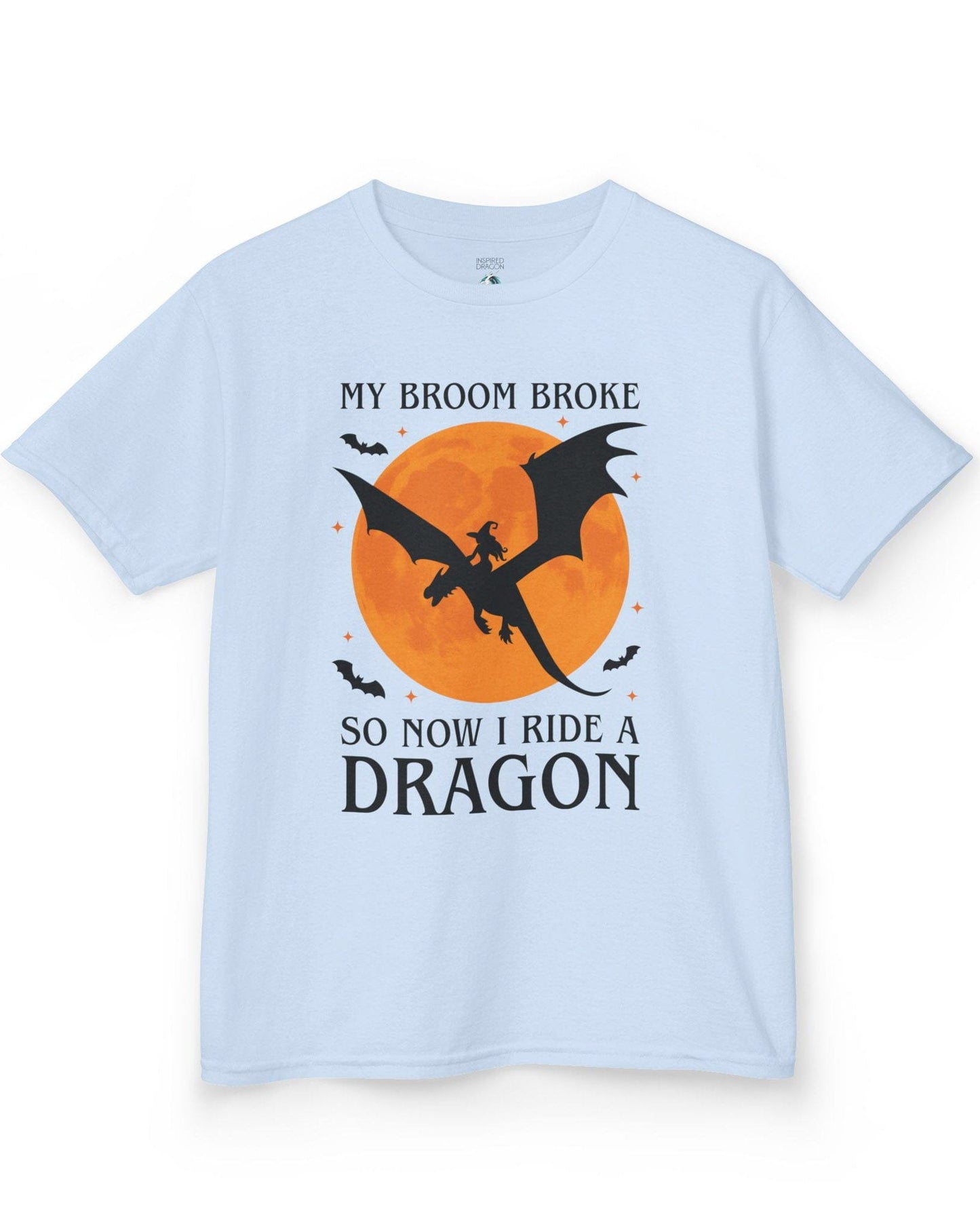 My Broom Broke shirt in light blue featuring a witch riding a dragon across an orange full moon with bats.