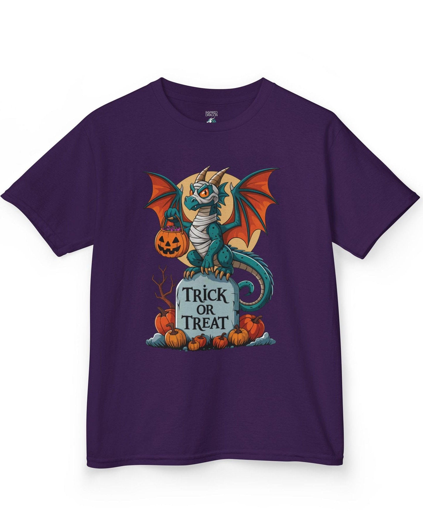 Trick or Treat shirt in purple featuring a mummy dragon on a tombstone with pumpkins and a full moon.