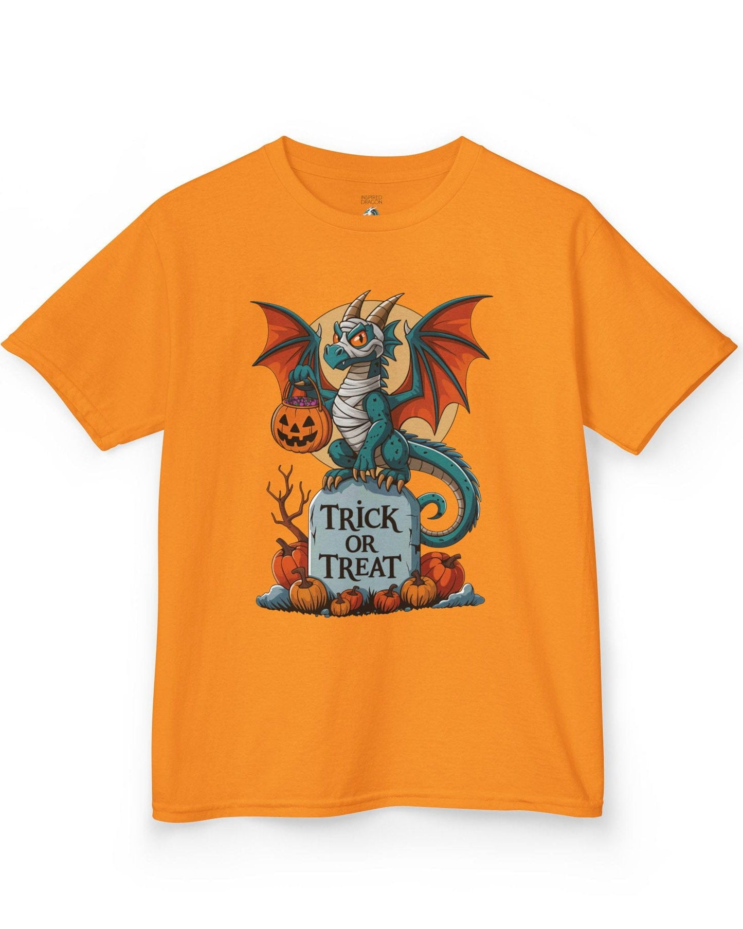 Trick or Treat shirt in orange featuring a mummy dragon on a tombstone with pumpkins and a full moon.