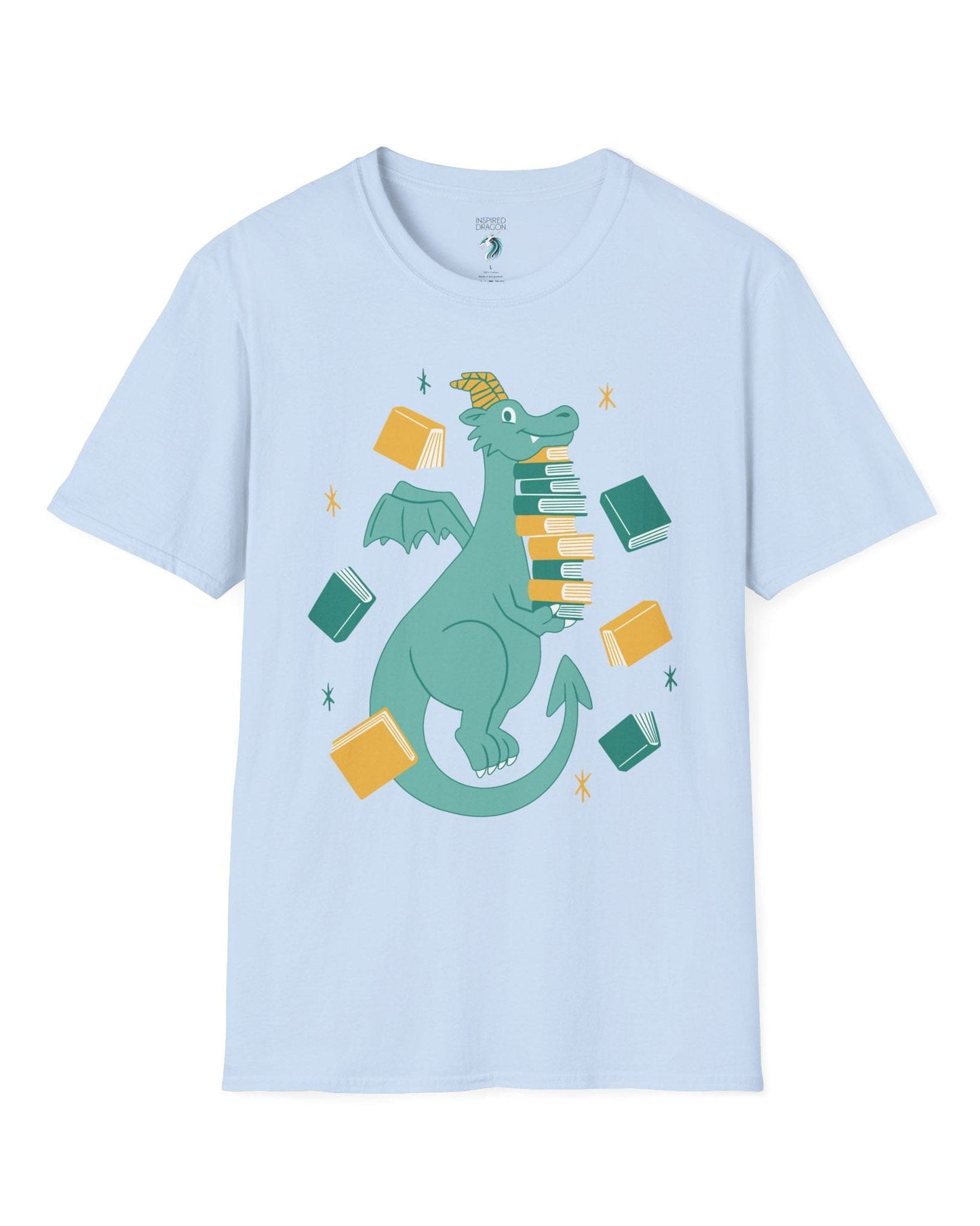 The Book Hoarder shirt in light blue featuring a cheerful teal dragon juggling a towering stack of books.