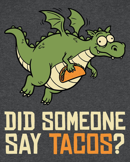 Did Someone Say Tacos shirt in dark heather featuring a goofy green dragon flying with a taco and bold playful lettering