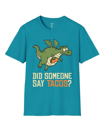 Did Someone Say Tacos shirt in tropical blue featuring a goofy green dragon flying with a taco and bold playful lettering