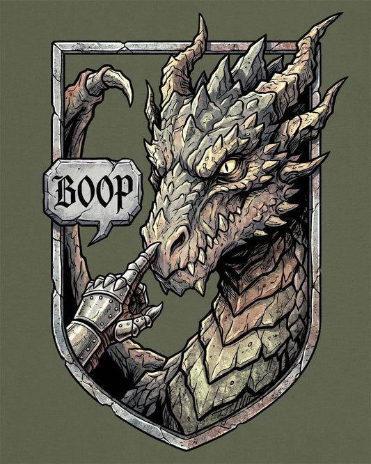 Dark Fantasy Boop shirt in military green featuring a gauntleted hand booping a fierce dragon’s nose inside a shield crest