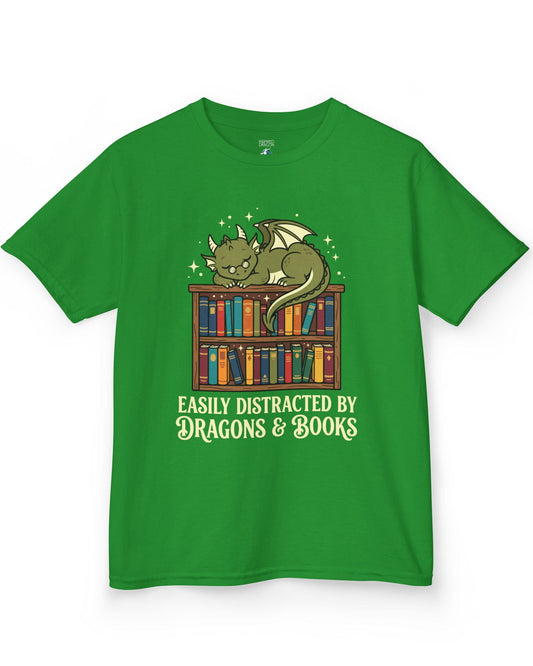 Easily Distracted by Dragons & Books shirt in Irish green with a sleepy bookworm dragon lounging on a colorful bookshelf