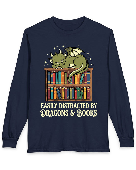 Easily Distracted by Dragons & Books shirt in navy with a sleepy bookworm dragon lounging on a colorful bookshelf