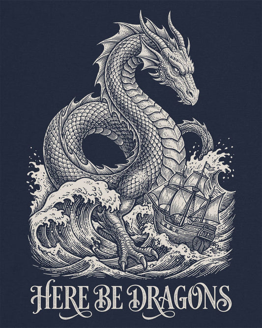 Here Be Dragons shirt in navy with a vintage sea serpent towering over stormy waves and a doomed sailing ship