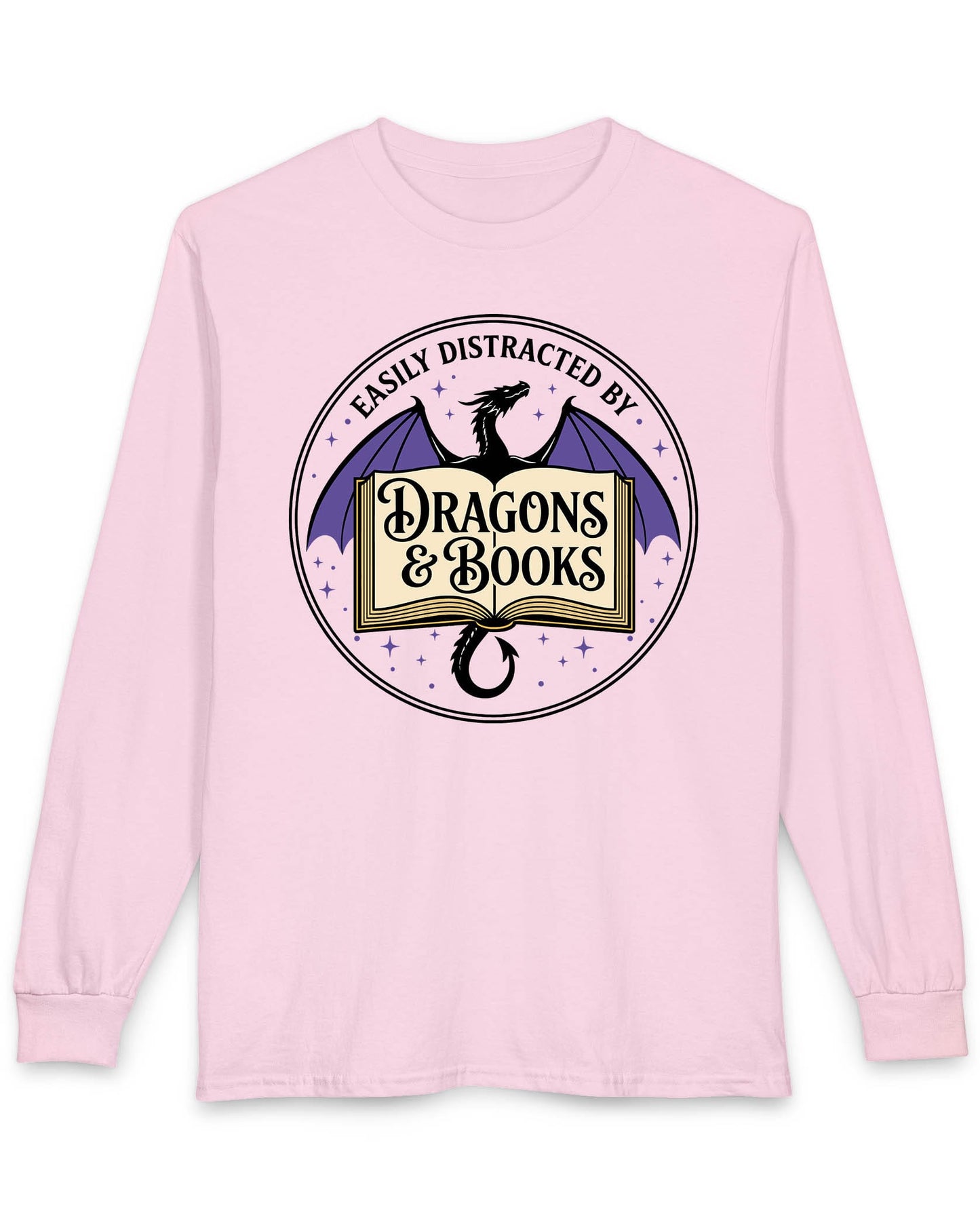 Easily Distracted shirt in light pink with a mystical dragon, open book, and cozy fantasy reader vibes